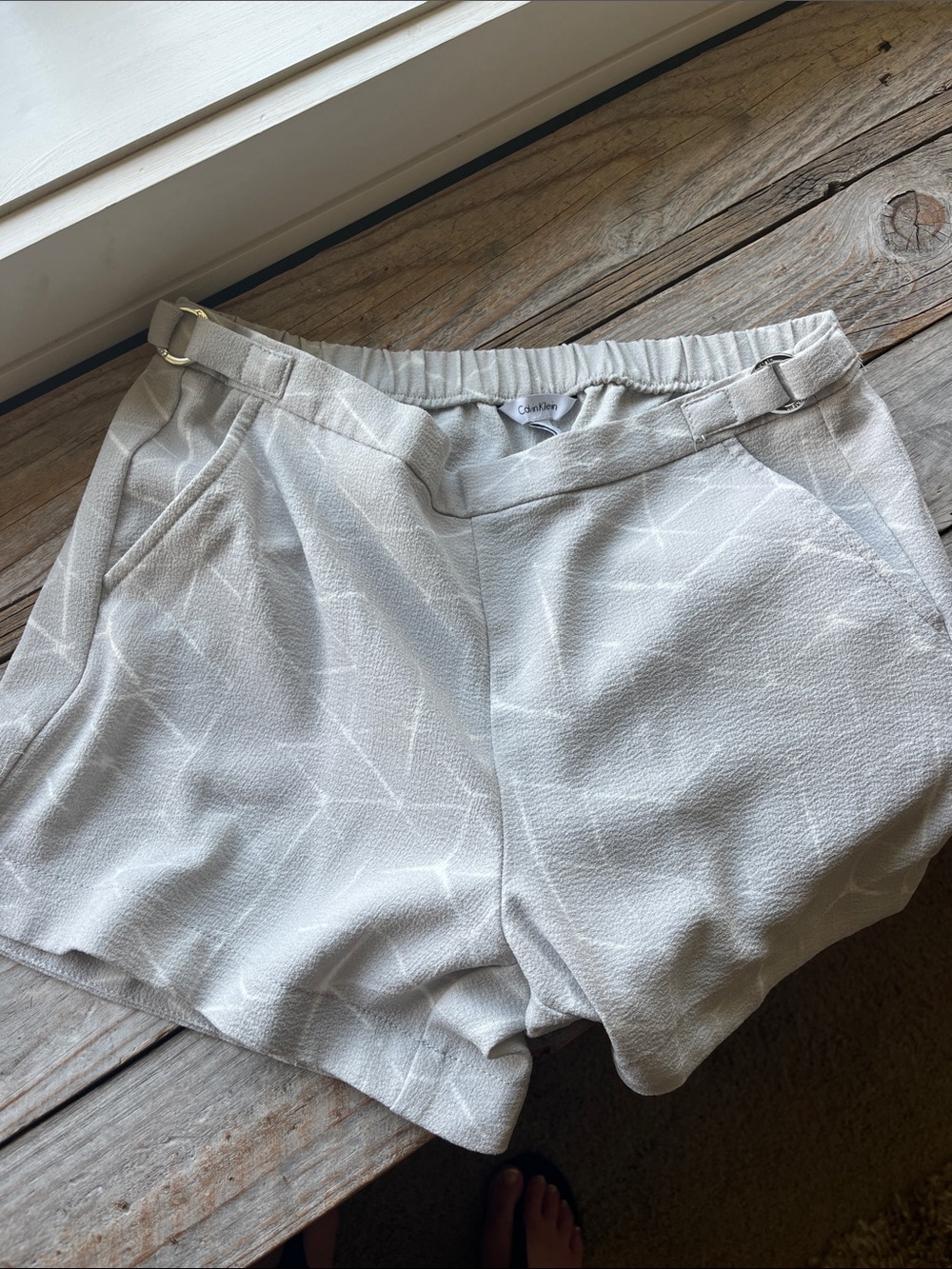 Calvin Klein Light Gray Textured Shorts with Subtle White Leaf Print
